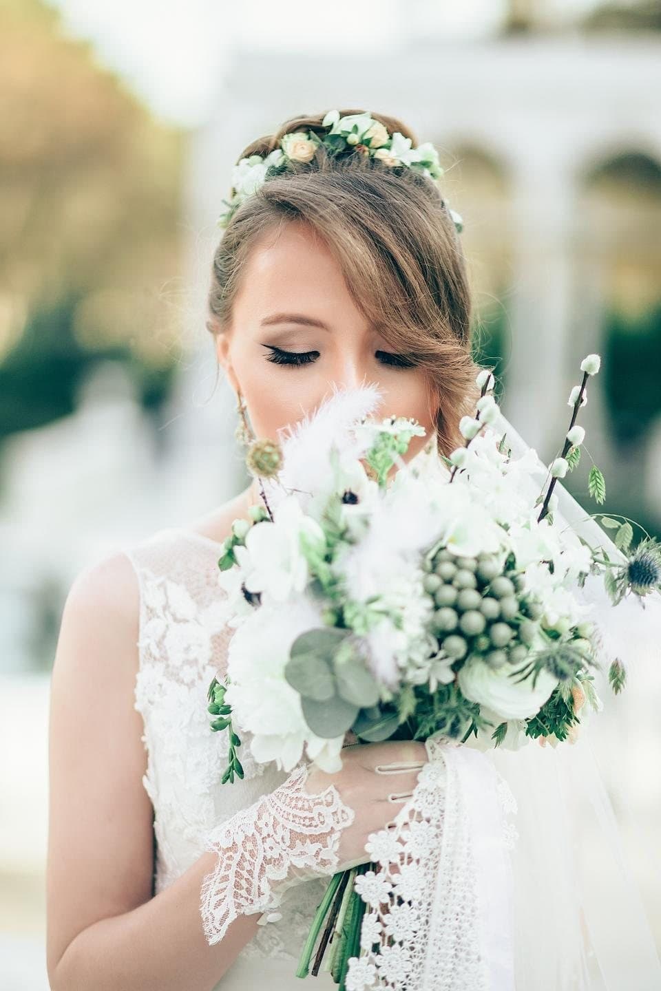 Bride holding a white bouquet